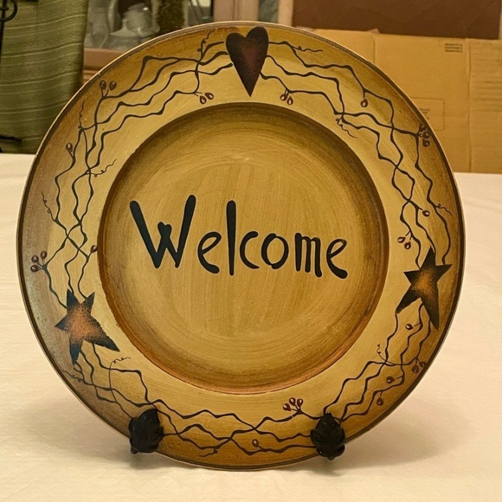 Welcome Plate approx. 10.5” across & metal wall hanger 9.5” length.